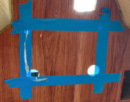 Teipillä merkattu sahauskohdat laipioon